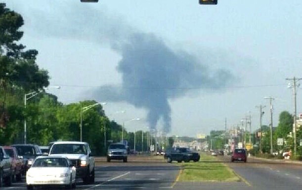 A plume of smoke covers Cleveland after a truck fire.