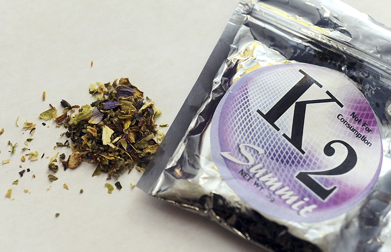 This Feb. 15, 2010, file photo, shows a package of K2 which contains herbs and spices sprayed with a synthetic compound chemically similar to THC, the psychoactive ingredient in marijuana.