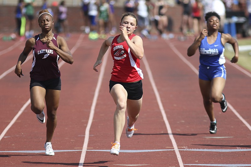 Signal Mountain High School's McKenzie Ethridge wins the first heat of the girls 100-meter dash during the TSSAA A-AA East Sub-Sectional Chattanooga Area Track Meet at Red Bank High School on Friday, May 8, 2015.