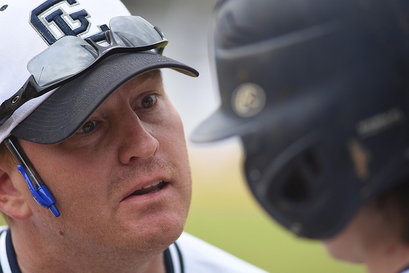 Gordon Lee coach Mike Dunfee talks with a player during the game against Dade County in Chickamauga. 