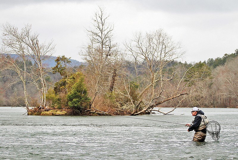 Tim Fisk flyfishes in the Hiwassee River in the early afternoon. Officials agreed to keep funding for three federal recreational trout fisheries in Tennessee and Georgia on Monday.