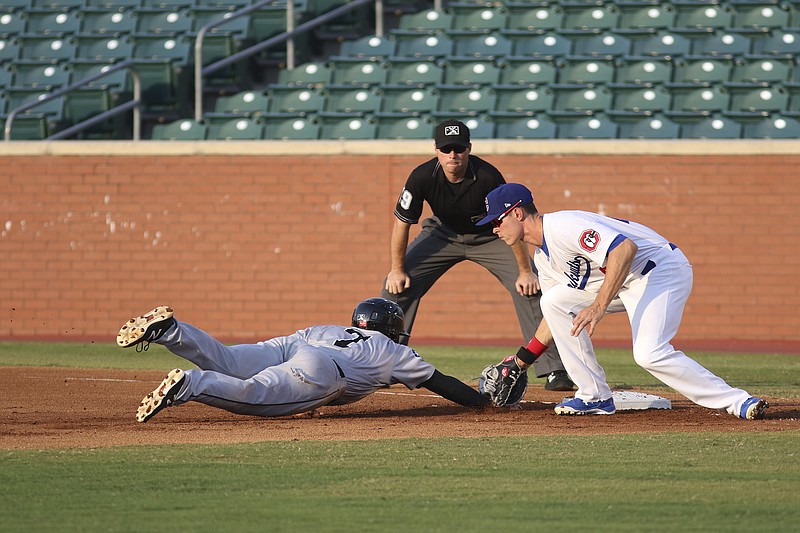 Chattanooga Lookouts' first baseman Max Kepler (40) picks off the Jackson Generals' Tyler Smith (7) while playing at the Lookouts home field in Chattanooga on Friday, May 8, 2015.