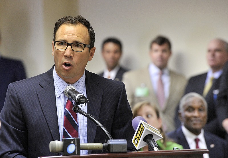 Robert McGhee, vice chair of the Poarch Creek Tribal Council, speaks in opposition of a proposed constitutional amendment to allow a state lottery and casinos at the state's four greyhound tracks during a public hearing Tuesday, May 12, 2015, at the Alabama State House in Montgomery, Ala.