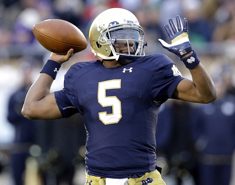 Notre Dame quarterback Everett Golson (5) looks to a pass during hisl game against Northwestern in South Bend, Ind., in this Nov. 15, 2014 file photo.
