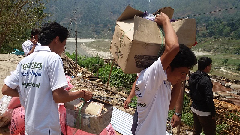 Nawaraj Baskota, Dilip, Sunil Kumar G, and Chris Smith of Chattanooga volunteer for Nickels for Nepal delivering relief materials, sanitation kits and medicine to Khopasi village.