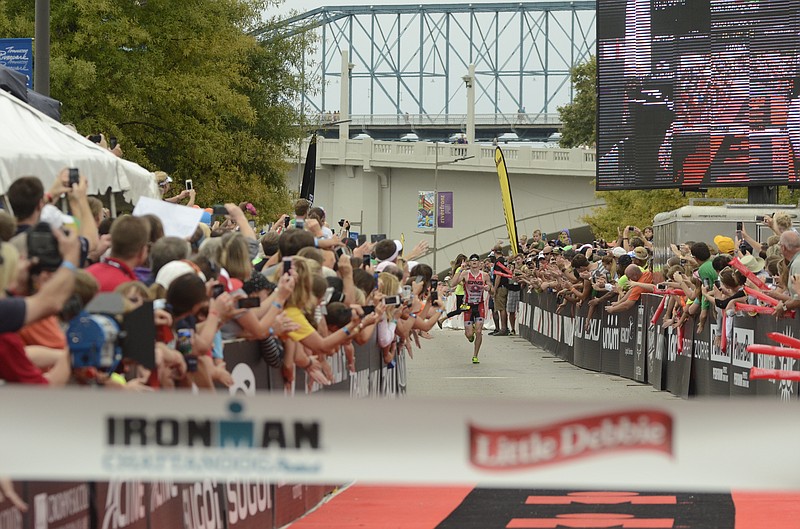 Matt Hanson of Storm Lake, Iowa, nears the finish line as he wins the Ironman Chattanooga in this Sept. 28, 2014, file photo.