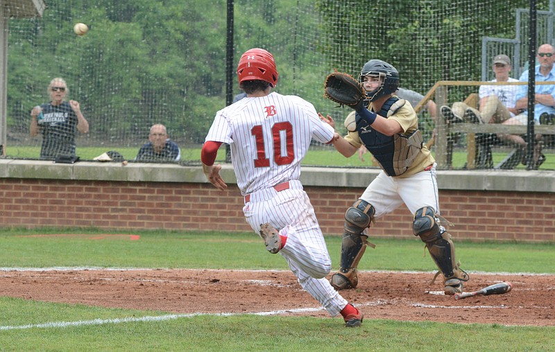 Catcher Jacob Tell waits for the throw to force Baylor's Tate Prater out at the plate with the bases loaded and no outs in the fourth inning of their state-quarterfinal-series baseball game against Pope John Paul II on Sunday, May 17, 2015, in Chattanooga. Baylor was unable to score in the inning.