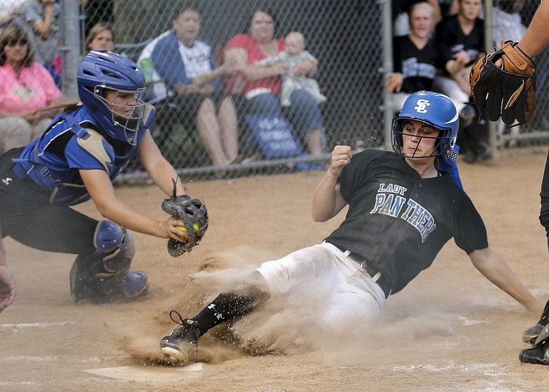 Sale Creek runner Jordan Duncan beats the tag by Jackson County catcher Tiffany Kellum to steal home during the Lady Panthers' state sectional softball game against Jackson County on Friday, May 15, 2015, at Sale Creek High School in Sale Creek, Tenn. Sale Creek won 18-2.