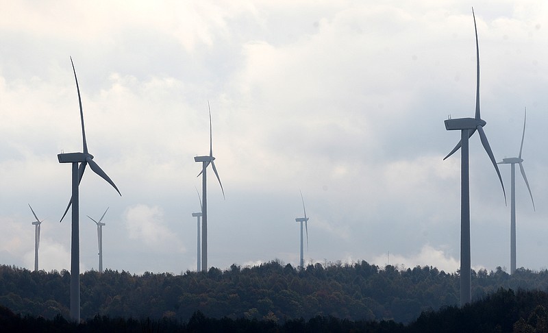 In this 2013 photo, several turbines are seen at the Buffalo Mountain Wind Farm in Oliver Springs, Tenn.