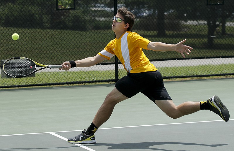 Hixson tennis player Alex Condra returns the ball during his boys' Class A-AA state team tennis tournament semifinal match against Trinity Christian on Tuesday, May 19, 2015, at the TSSAA Spring Fling in Murfreesboro, Tenn.