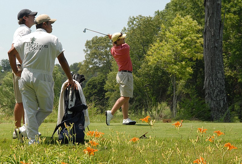 Kris Mikkelsen hits a tee shot during the final round of the 2011 Lupton Memorial golf tournament at the Honors Course in Ooltewah. 