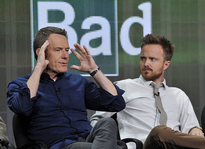 
              FILE - In this July 26, 2013 file photo, Bryan Cranston, left, and Aaron Paul, cast members in "Breaking Bad," take part in a panel discussion during AMC's Summer 2013 TCA press tour in Beverly Hills, Calif. A University of New Mexico School of Law student journal has published a special issue analyzing legal issues related to the story line of AMC-TV's "Breaking Bad." An edition of the New Mexico Law Review released this week looks at the war on drugs, the hypothetical arrest of Walter White, and questionable practices of defense lawyer Saul Goodman.Editor Matthew Zidovsky says students wanted to use the fictional hit television series to discuss serious legal issues like the Fourth Amendment and professional lawyer ethics. (Photo by Chris Pizzello/Invision/AP, File)
            