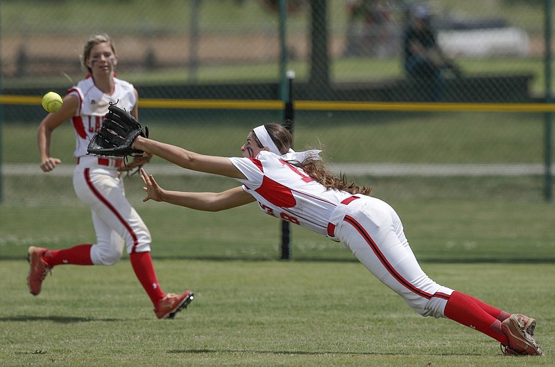 Ooltewah center fielder Allie Jones tries to make a diving catch during their Class AAA state softball tournament game against Bearden on Wednesday, May 20, 2015, at the TSSAA Spring Fling in Murfreesboro, Tenn. Ooltewah won 5-0.