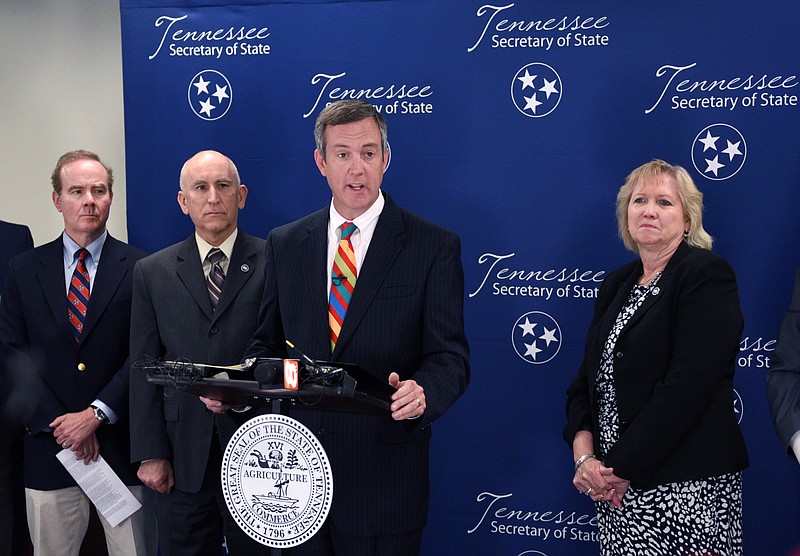Tennessee Secretary of State Tre Hargett announces a federal lawsuit against several cancer charities Tuesday, May 19, 2015, in Knoxville