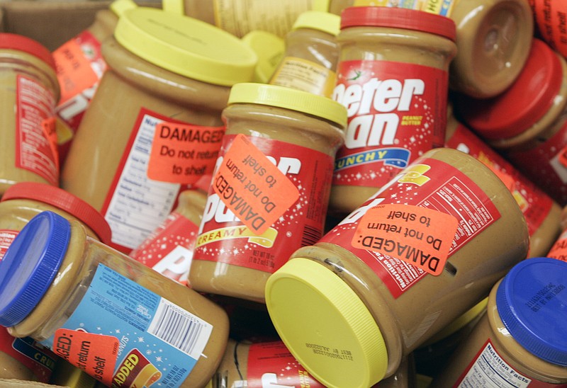 In this Feb. 16, 2007, file photo, returned jars of Peter Pan Peanut Butter are shown at a super market in Atlanta.