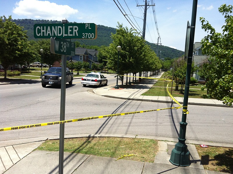 Chattanooga police work the scene of a midday shooting on 38th Street that left one person wounded with non life-threatening injuries Wednesday, May 20, 2015 in Chattanooga , Tenn.