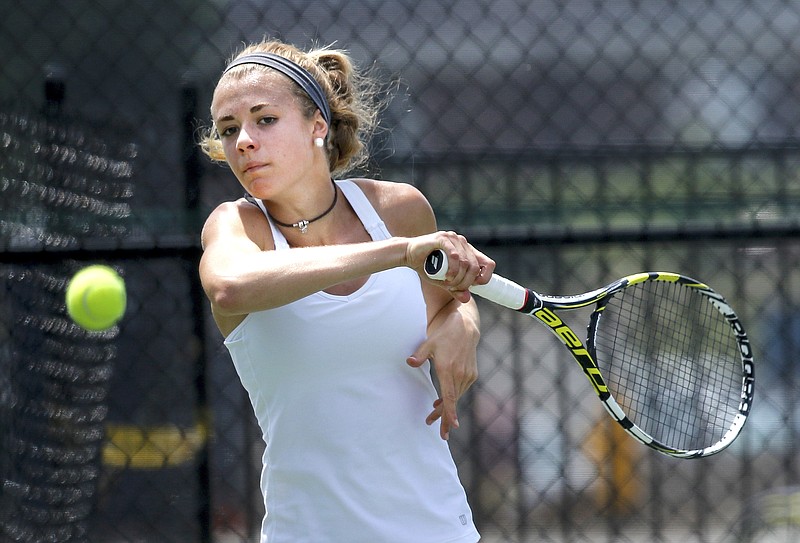 Baylor's Ashton Jenne returns the ball during her girls' II-AA state team tennis tournament semifinal doubles match against Harpeth Hall on Tuesday, May 19, 2015, at the TSSAA Spring Fling in Murfreesboro, Tenn.