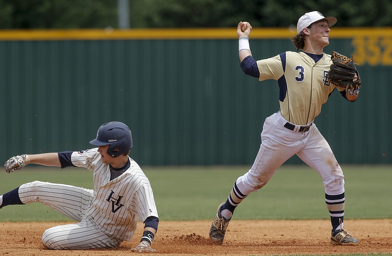 Soddy-Daisy infielder Justin Cooke makes the throw to 1st to try for a double play after forcing out Hardin Valley runner Landen Beyer during their Class AAA state baseball tournament at the TSSAA Spring Fling in Murfreesboro, Tenn., on Wednesday, May 20, 2015.