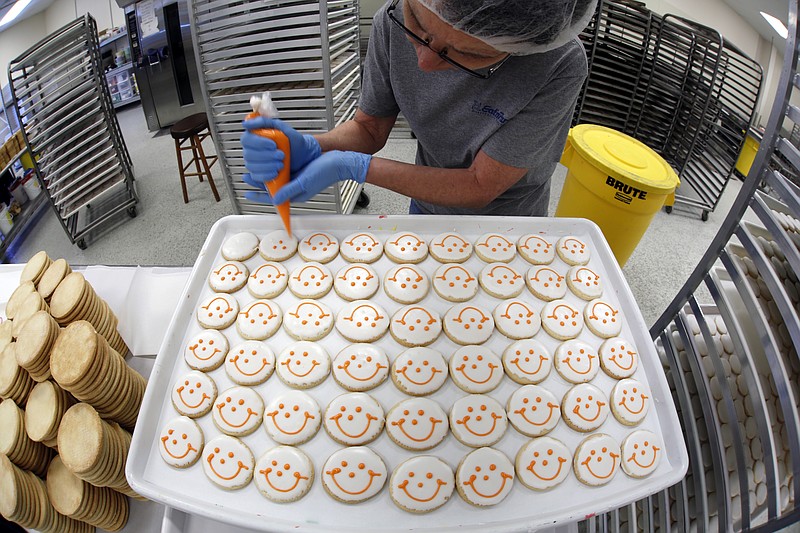 Suit: Competitor's smiley face cookies 'confusingly similar ...