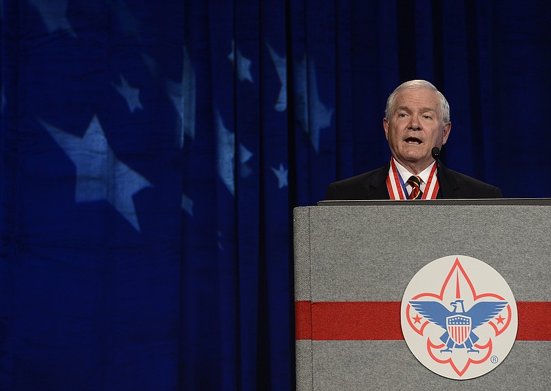 In this Friday, May 23, 2014, file photo, former Defense Secretary Robert Gates addresses the Boy Scouts of America's annual meeting in Nashville after being selected as the organization's new president. On Thursday Gates said that the organization's longstanding ban on participation by openly gay adults is no longer sustainable, and called for change in order to avert potentially destructive legal battles.
            