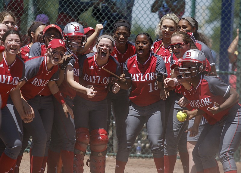 Baylor players wait at the plate to celebrate with teammate Mari Gardner after Gardner's go-ahead homer in the 4th inning of Baylor's 6-4 win over GPS in their D-II AA state softball tournament championship game at the TSSAA Spring Fling in Murfreesboro, Tenn., on Thursday, May 21, 2015,