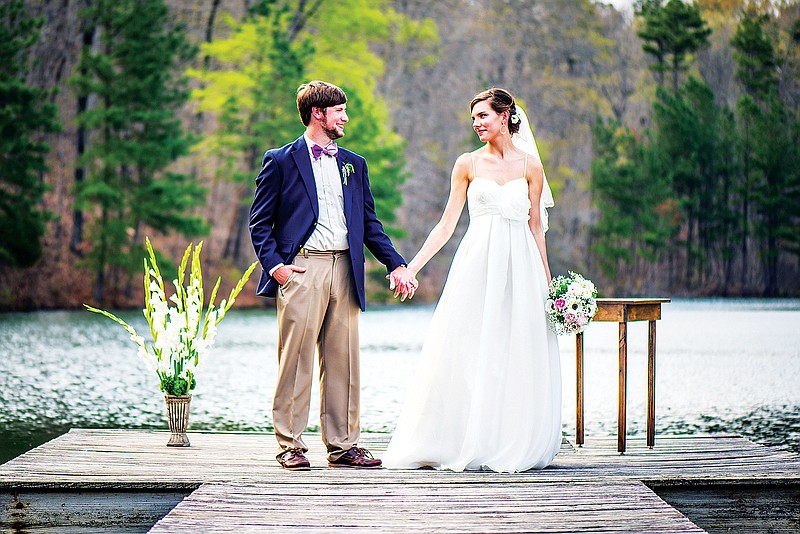 Tori Woodson, 24, right, and Jake Willcutt, 29, married last month at Johnston Woods in McDonald, Tenn., after dating for 11 months. (Cameron Coker Photography)