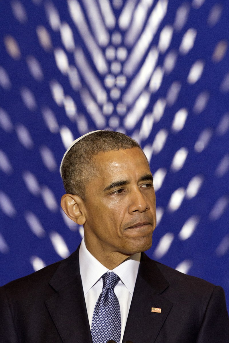 
              President Barack Obama pauses while speaking at Adas Israel Congregation in Washington, Friday May 22, 2015, as part of Jewish American Heritage Month, The president addressed one of the largest Jewish congregations in Washington to highlight efforts to combat anti-Semitism, a problem he says has created an intimidating environment worldwide for Jewish families. The appearance coincides with Solidarity Shabbat, devoted to showing unity by political leaders in Europe and North America against anti-Semitism. (AP Photo/Jacquelyn Martin)
            