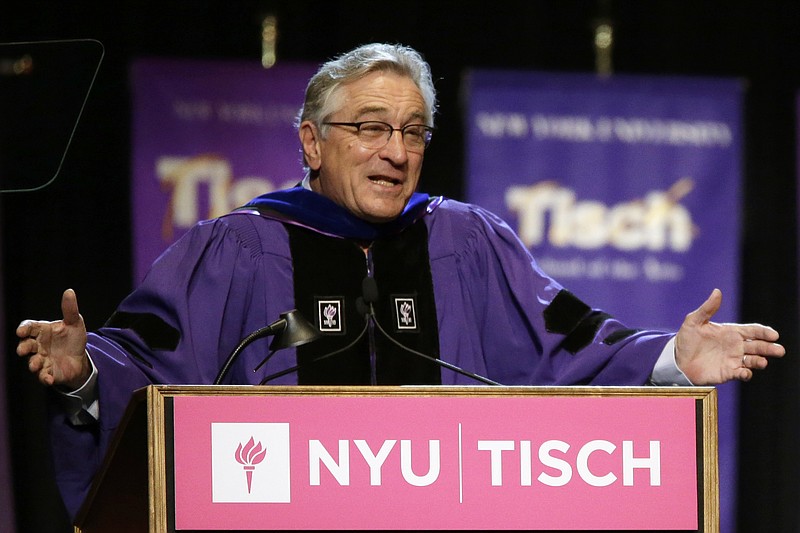 
              Actor Robert De Niro addresses the class of 2015, faculty, and guests during  New York University's Tisch School of the Arts commencement  ceremony,  Friday, May 22, 2015, in New York. De Niro, who quit high school to pursue an acting career, was the honored speaker at the raucous ceremony for 1,200 graduates at The Theater at Madison Square Garden. (AP Photo/Mary Altaffer)
            