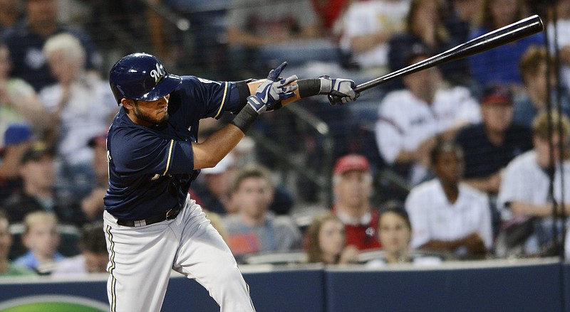 Milwaukee Brewers shortstop Luis Sardinas (10) follows through on a one-run single in the fourth inning of their game against the Atlanta Braves Friday, May 22, 2015, in Atlanta.