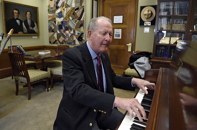
              Sen. Lamar Alexander, R-Tenn., plays piano in his office on Capitol Hill in Washington, Friday, May 22, 2015. Alexander, who had the piano delivered to his Capitol Hill office so he could practice, is slated to deliver a sunset piano performance of "Ol' Man River" on the banks of the Mississippi River with the Memphis Symphony Orchestra Saturday. But the Senate’s slow-motion amble toward Memorial Day break threatens all that. (AP Photo/Susan Walsh)
            