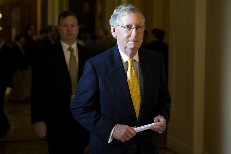 Senate Majority Leader Sen. Mitch McConnell of Ky. walks to his office on Capitol Hill in Washington on this May 5, 2015, file photo.