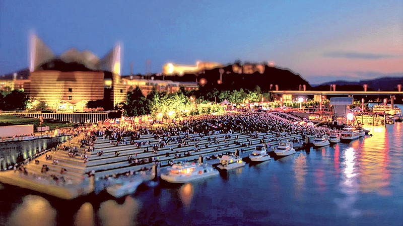 Boats line Chattanooga's riverfront with the Tennessee Aquarium rising in the background.
(Chattanooga Convention & Visitor's Bureau Photo)