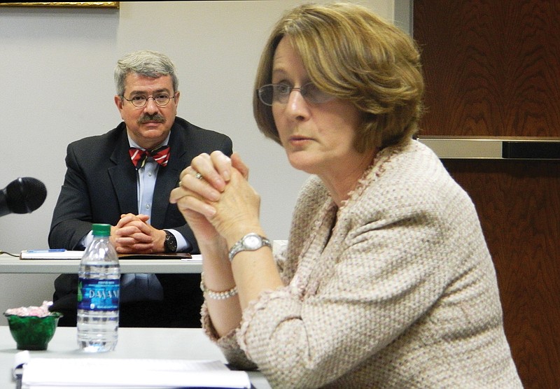 Dr. Linda Cash, the new director of schools for Bradley County, answers questions posed by the school board during a public interview on Monday evening. Scott Bennett, attorney for the school system, listens.