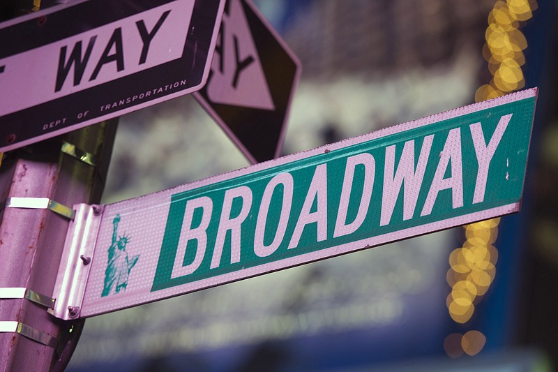 
              FILE - In this Jan. 19, 2012 file photo, a Broadway street sign is seen in Times Square in New York. Broadway's revenue and attendance figures both hit record highs this season, fed largely by premium prices and a steady stream of more shows. The Broadway League said Tuesday, May 26, 2015, that box offices reported a record total gross of $1.36 billion - up from $1.27 billion from the previous season.  (AP Photo/Charles Sykes, File)
            