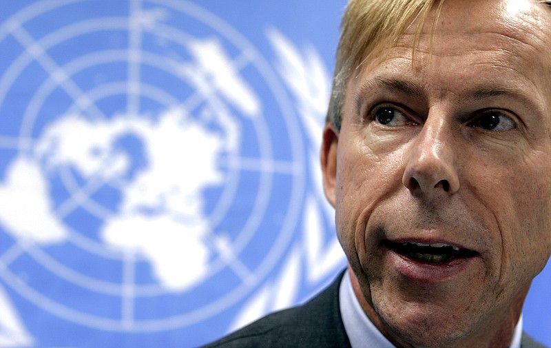 In this Feb. 13, 2006, file photo, Anders Kompass, the U.N. High Commission for Human Rights representative in Guatemala, speaks with members of the media during a news conference in Guatemala City. 