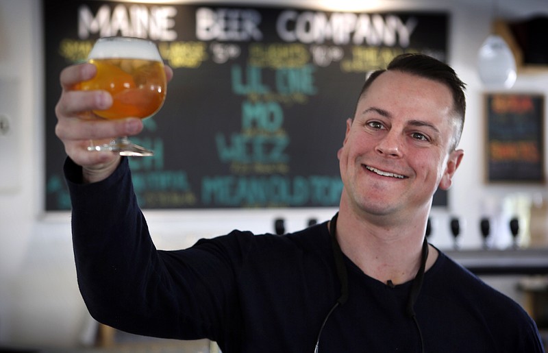 
              In this May 7, 2015 photo, Dan Kleban, a co-owner of the Maine Beer Company, poses in the company's tasting room in Freeport, Maine. Craft beer now accounts for 1 of 10 beers sold. (AP Photo/Robert F. Bukaty)
            