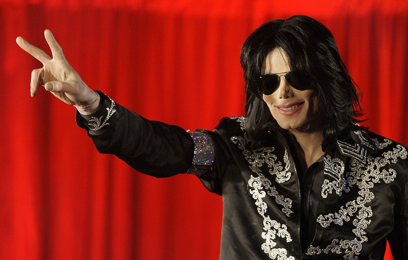 
              FILE - In this March 5, 2009 file photo, US singer Michael Jackson speaks at a press conference at the London O2 Arena. A Los Angeles judge ruled on Tuesday, May 26, 2015, that choreographer Wade Robson waited too long to file a claim alleging that Jackson abused him and the allegations should be dismissed. (AP Photo/Joel Ryan, File)
            