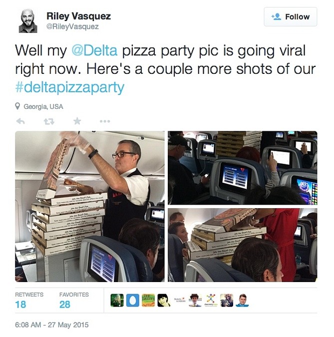 User @RileyVasquez tweeted out photos of the pizza party on the diverted Delta plane at McGhee Tyson Airport.