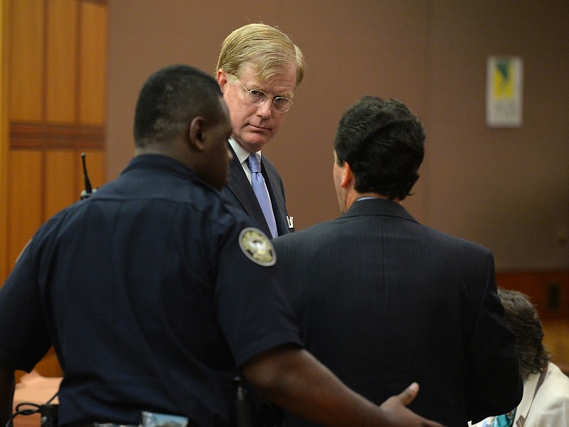 In this Sept. 5, 2014, file photo U.S. District Court Judge Mark Fuller appears in Fulton County Court.