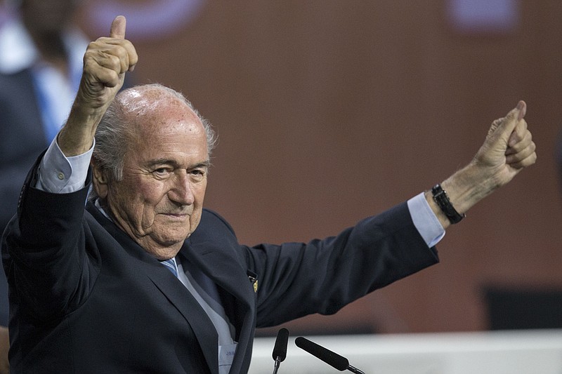 
              FIFA president Sepp Blatter after his election as President at the Hallenstadion in Zurich, Switzerland, Friday, May 29, 2015. Blatter has been re-elected as FIFA president for a fifth term, chosen to lead world soccer despite separate U.S. and Swiss criminal investigations into corruption. The 209 FIFA member federations gave the 79-year-old Blatter another four-year term on Friday after Prince Ali bin al-Hussein of Jordan conceded defeat after losing 133-73 in the first round.  (Patrick B. Kraemer/Keystone via AP)
            