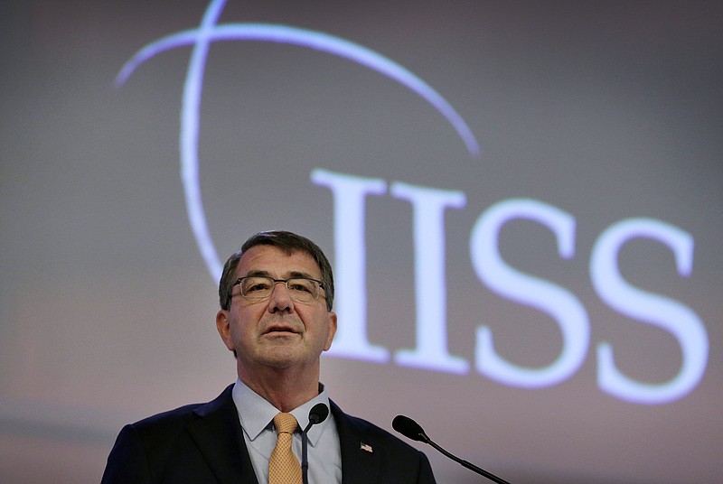 
              U.S. Secretary of Defense Ashton Carter delivers his speech about "The United States and Challenges to Asia-Pacific Security" during the 14th International Institute for Strategic Studies Shangri-la Dialogue, or IISS, Asia Security Summit, Saturday, May 30, 2015, in Singapore. (AP Photo/Wong Maye-E)
            