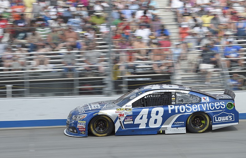 Jimmie Johnson drives during a NASCAR Sprint Cup series auto race Sunday, May 31, 2015, at Dover International Speedway in Dover, Del. Johnson won the race.