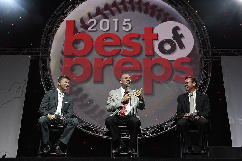 Former Atlanta Braves pitcher John Smoltz tells one of his many life stories at the 2015 Best of Preps banquet at the Chattanooga Convention Center. Stephen Hargis, left, and David Paschall listen.