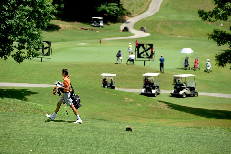 Golfers participate in the Evitt Foundation RTC Junior All-Star, an American Junior Golf Association event, at Windstone golf course Tuesday, June 2,  2015, in Catoosa County, Ga. 