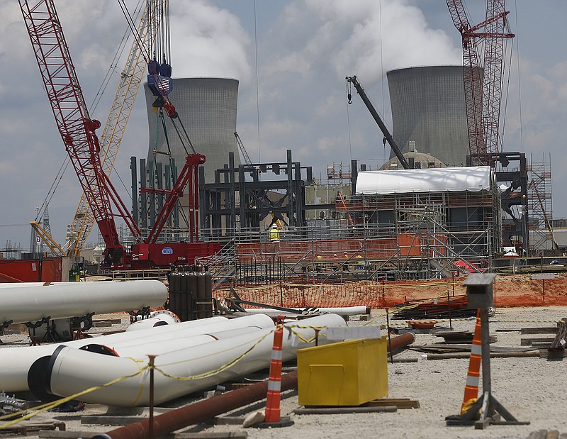 In this June 13, 2014, file photo, construction continues on a new reactor at Plant Vogtle Nuclear Power Plant in Waynesboro, Ga.