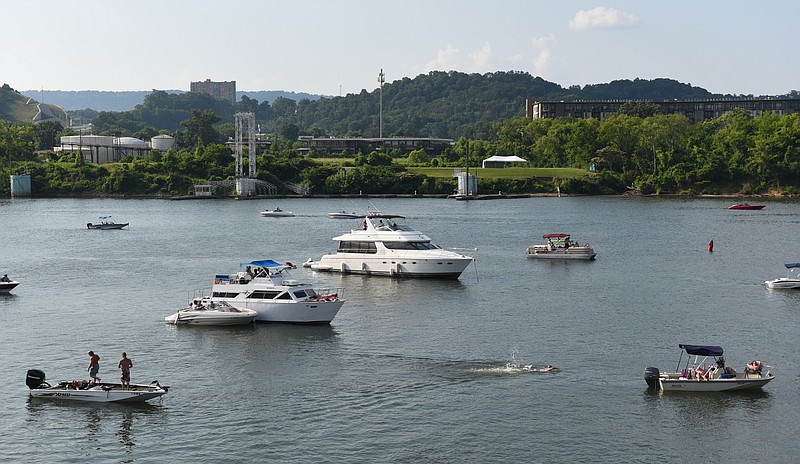 Boaters gather on the Tennessee River near the Coca Cola Stage at the Riverbend Festival on Sunday, June 7, 2015.