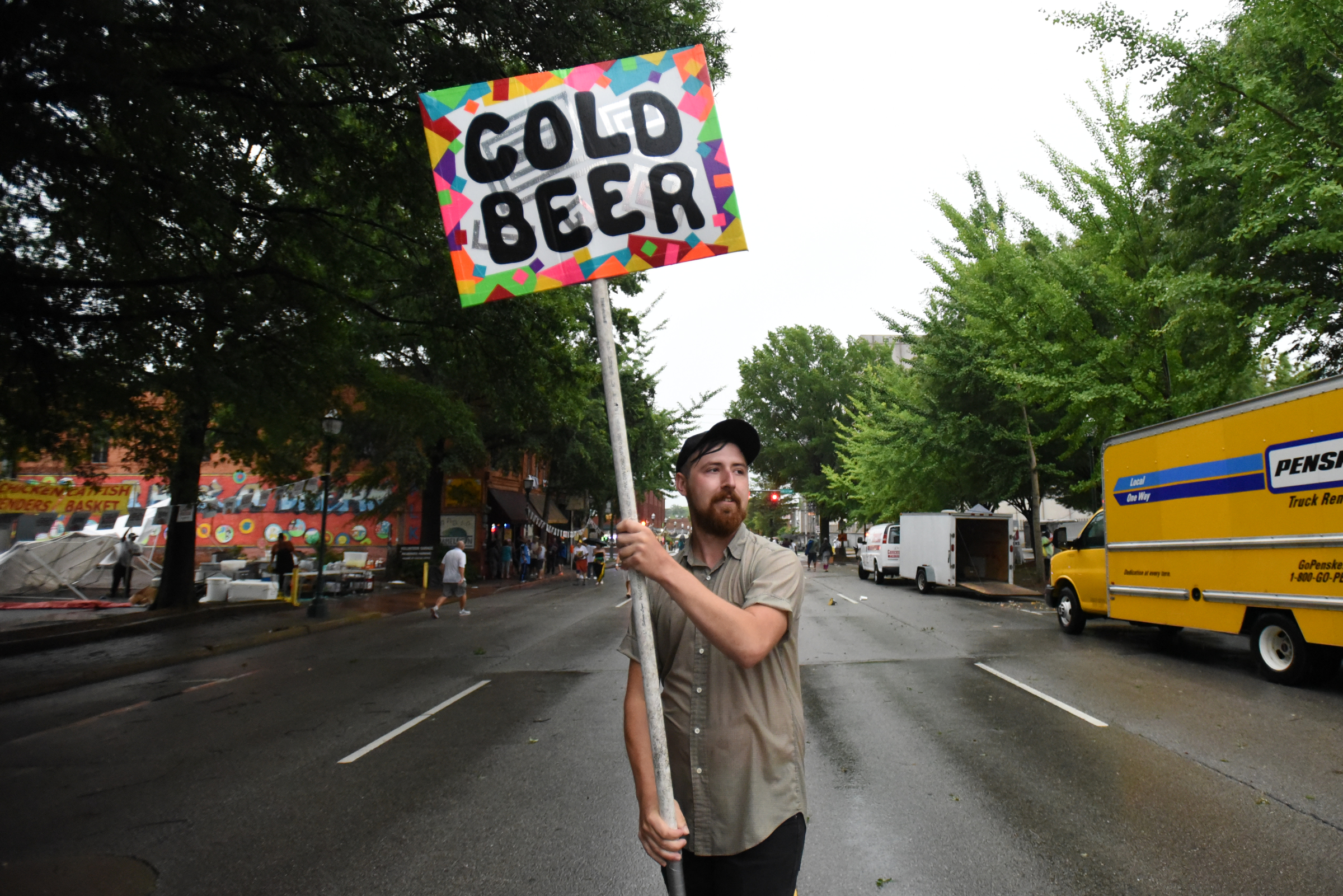 Staff Photo by Angela Lewis Foster/ The Chattanooga Times Free Press- 6/08/15
Ryan Darling, from J J's Bohemia, tries to keep the party going after the streets emptied because of a torrential downpour Monday at the Bessie Smith Strut.