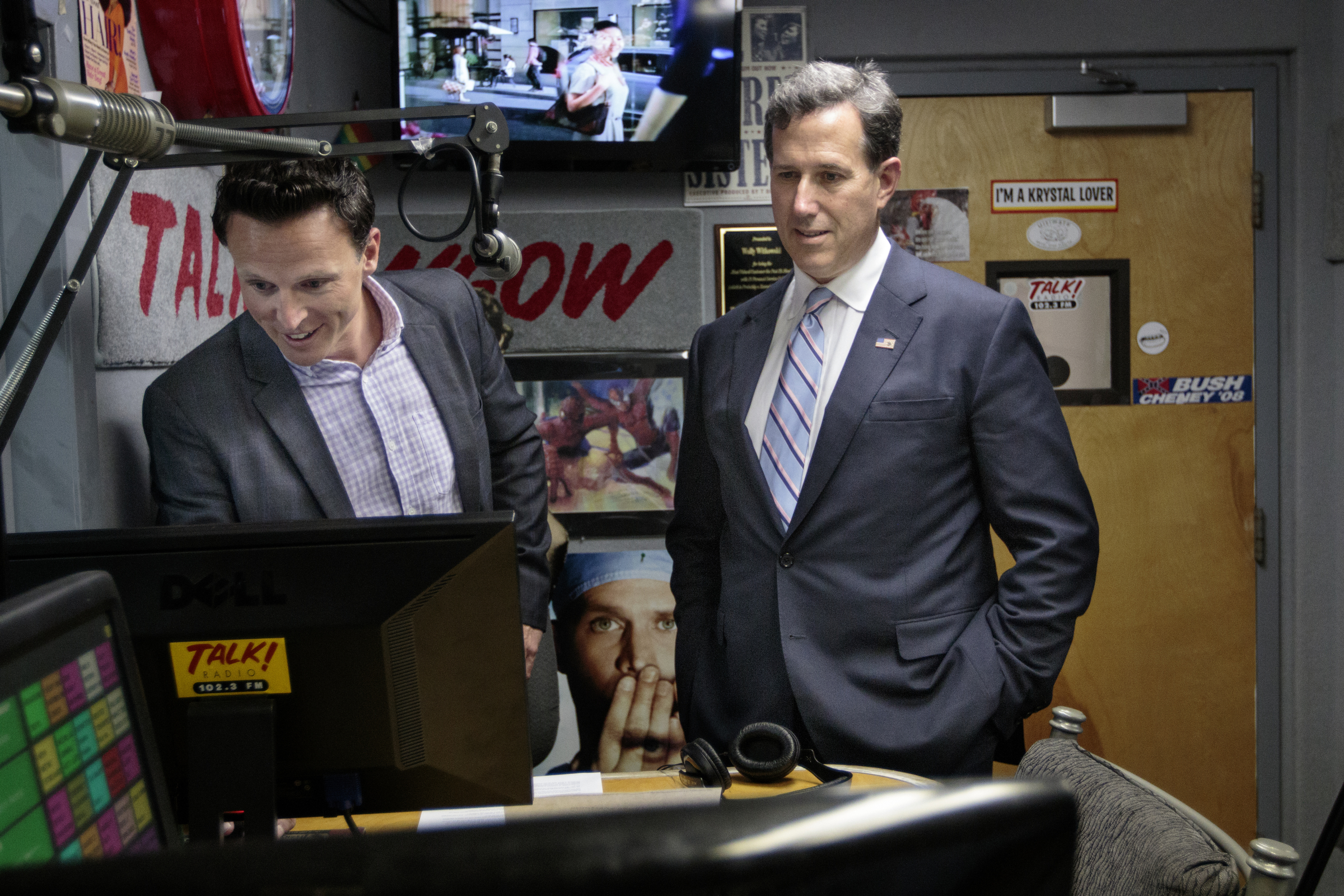 Staff photo by Doug Strickland
Candidate for the GOP presidential nomination and former U.S. Sen. Rick Santorum, right, talks with Brian Joyce during a break in Joyce's interview with Santorum on Wednesday, June 10, 2015, at Cumulus Media in Chattanooga, Tenn. Sen. Santorum later spoke at the Hamilton County GOP's Lincoln Day dinner at the Chattanoogan Hotel.