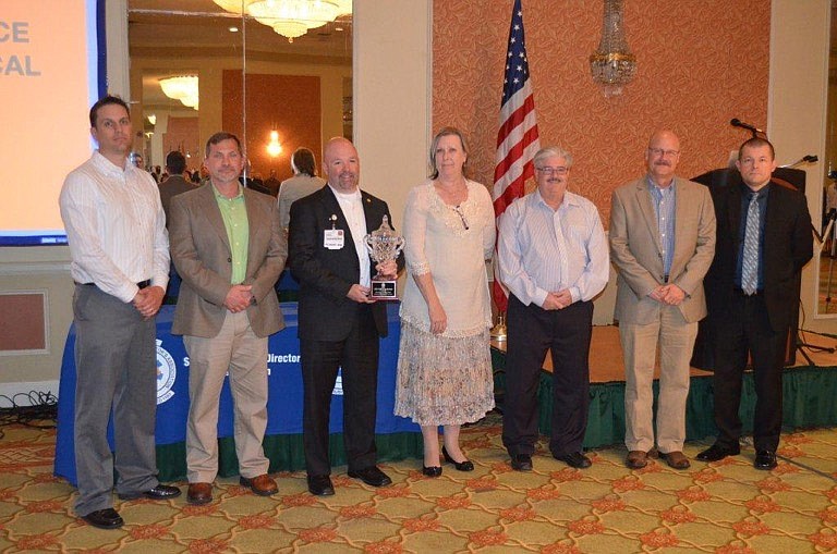 Contributed PhotoAccepting the Southeastern EMS Director's Association award are, from left, Derek Ball, Life Force 1 clinical base supervisor; Curtis Fowler, operations director; Robbie Tester, Life Force administrator; Deborah Cox, Tennessee EMS consultant, Region 3; Johnny Hale, CQI coordinator; Jim Fox, Life Force business development manager; and Stacy Prater, Life Force clinical educator.