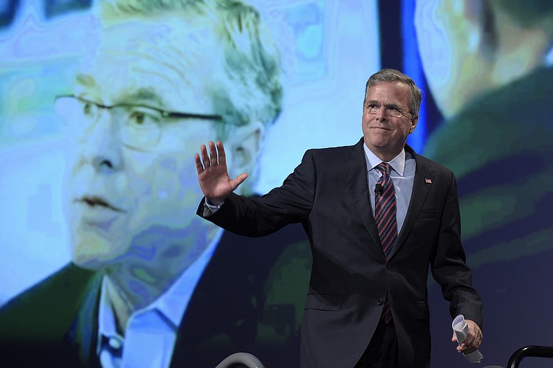 Former Florida Gov. Jeb Bush waves at a recent political function. He is expected to officially announce his candidacy for president on Monday.